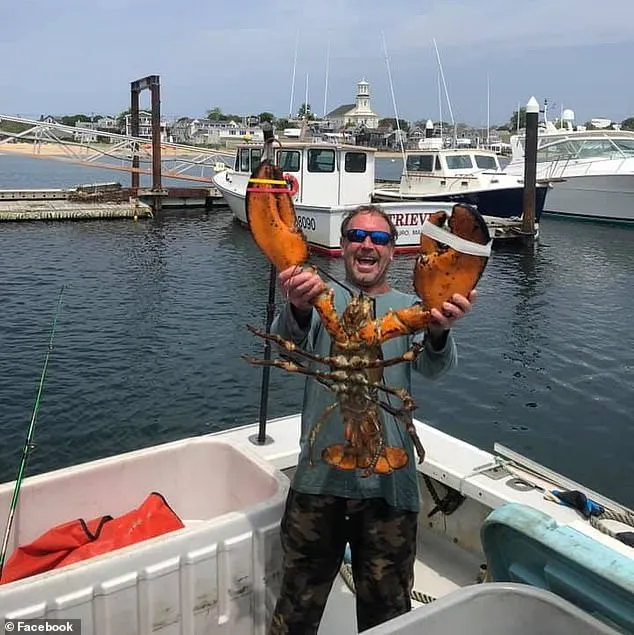Michael Packard holding a lobster